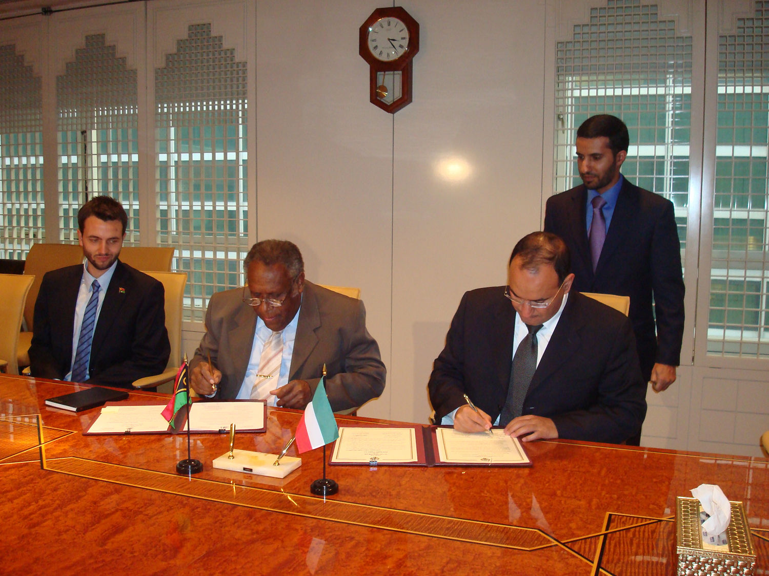 The Kuwaiti permanent delegate to the UN, Ambassador Mansour Al-Otaibi during the signing of the agreement with his counterpart Ambassador of Vanuatu, Donald Kalpokas