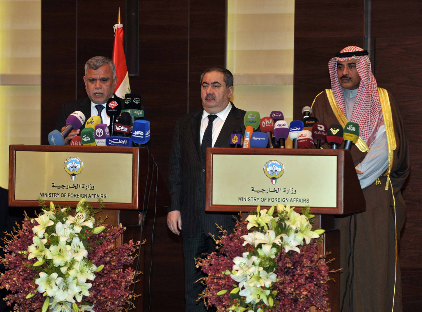 Deputy Prime Minister and Foreign Minister Sheikh Sabah Al-Khalid Al-Hamad Al-Sabah with Iraqi Foreign Minister Hoshyar Zebari and Transport Minister Hadi Al-Amri