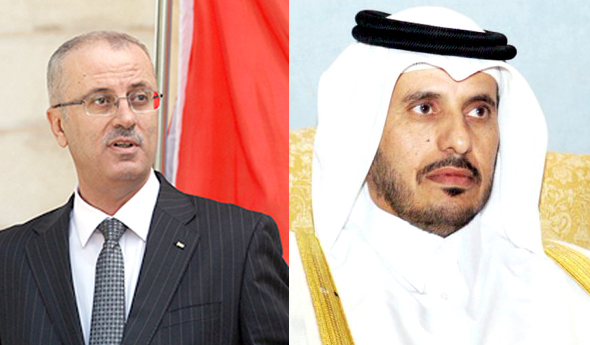 Qatari Prime Minister Sheikh Abdullah Bin Nasser Bin Khalifa Al-Thani and Palestinian counterpart Rami Hamdallah
