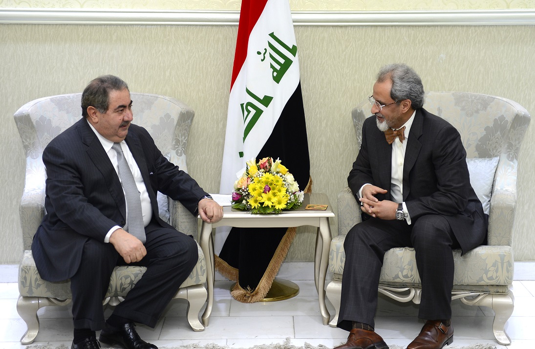 Iraqi Finance Minister Hoshyar Zebari with Kuwaiti Ambassador in Iraq Ghassan Al-Zawawi