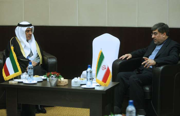 Iranian Minister of Culture and Islamic Guidance Ali Jannati with Assistant Undersecretary of the Kuwaiti Ministry of Information for External Media Affairs Faisal Al-Mitlagim