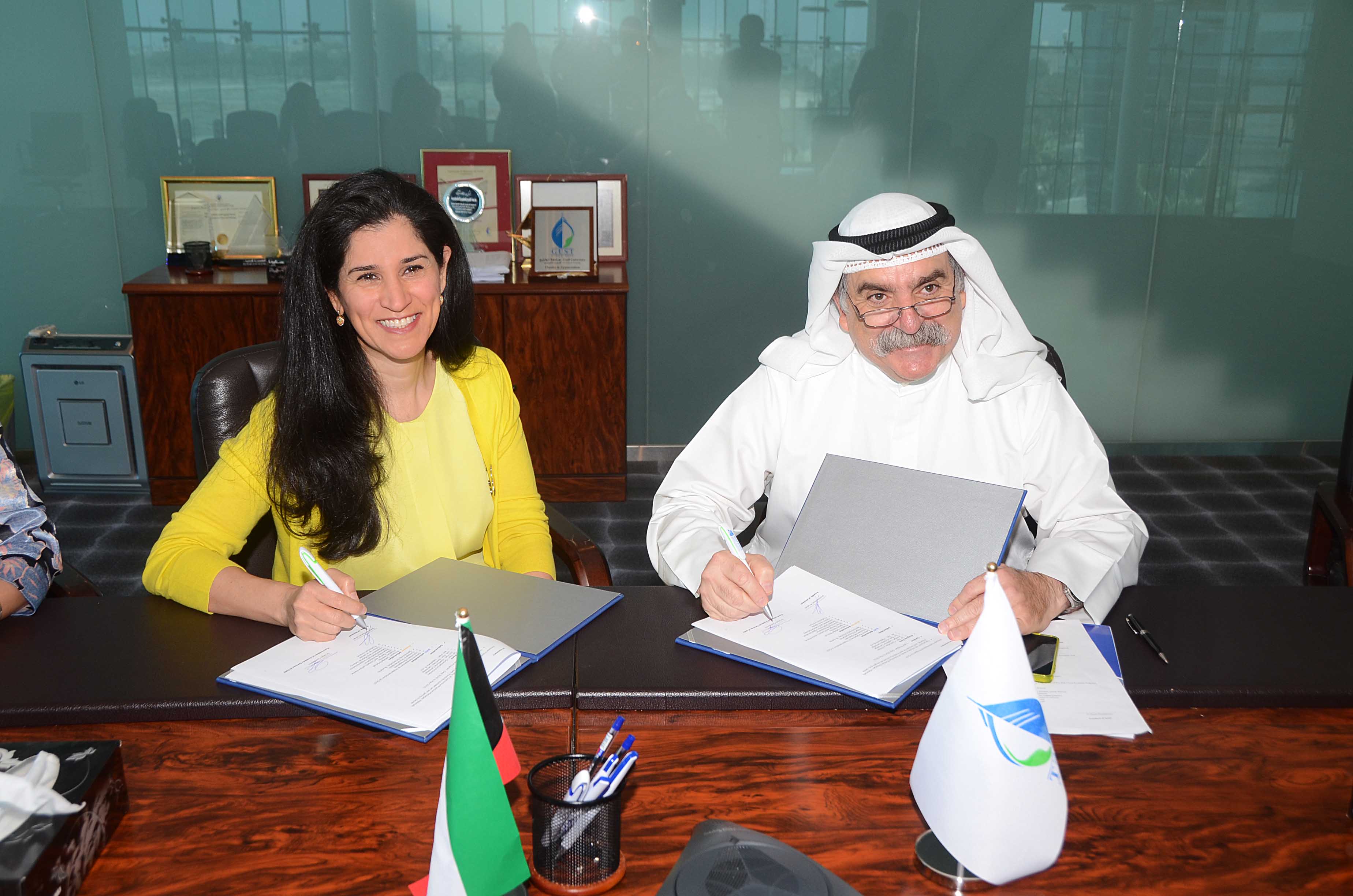 Sheikha Intisar Salem Al-Ali Al-Sabah signing the agreement with Gulf University for Science and Technology (GUST)