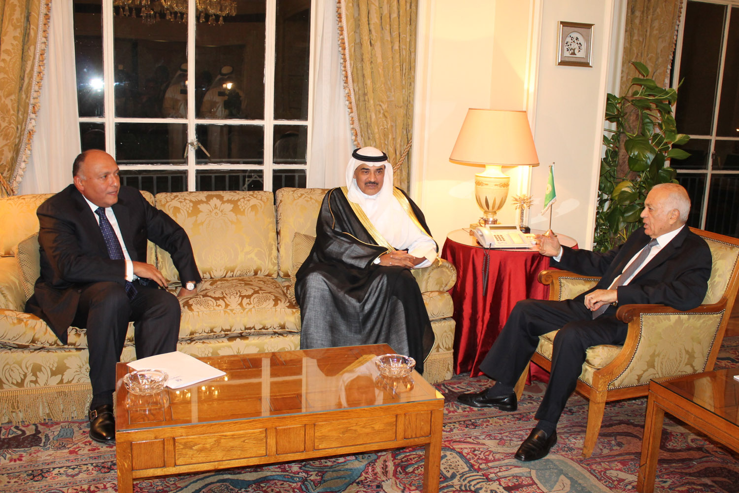Kuwait's First Deputy Prime Minister and Foreign Minister Sheikh Sabah Khaled Al-Hamad Al-Sabah meets with Arab League Secretary General Nabil Al-Araby and Egyptian Foreign Minister Sameh Shukri
