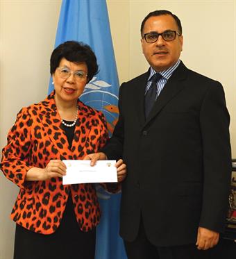 Director-General of the World Health Organization (WHO) Margaret Chan with Kuwait Permanent Delegate at the United Nations Ambassador Jamal Al-Ghunaim