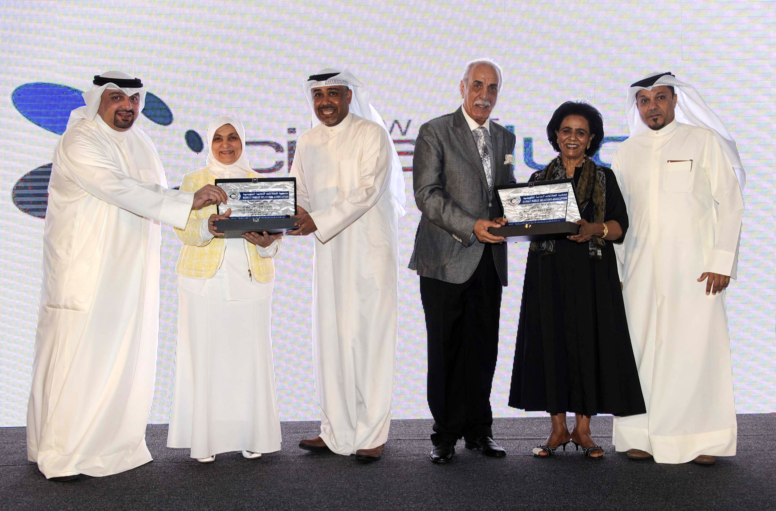 Minister of Social Affairs and Labor Hind Al-Sabeeh, Sheikha Fareeha Al-Ahmad Al-Jaber Al-Sabah during the honoring