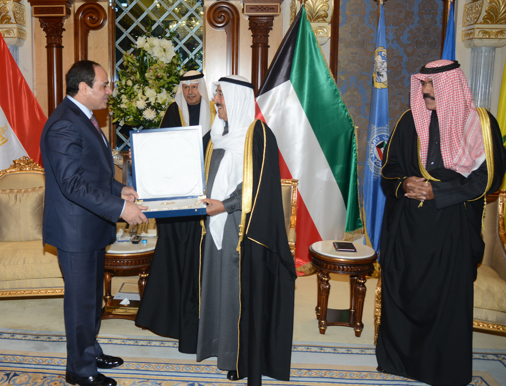 His Highness the Amir Sheikh Sabah Al-Ahmad Al-Jaber Al-Sabah grants Egyptian President Abdelfatah Al-Sisi with the Order of Mubarak Al-Kabeer