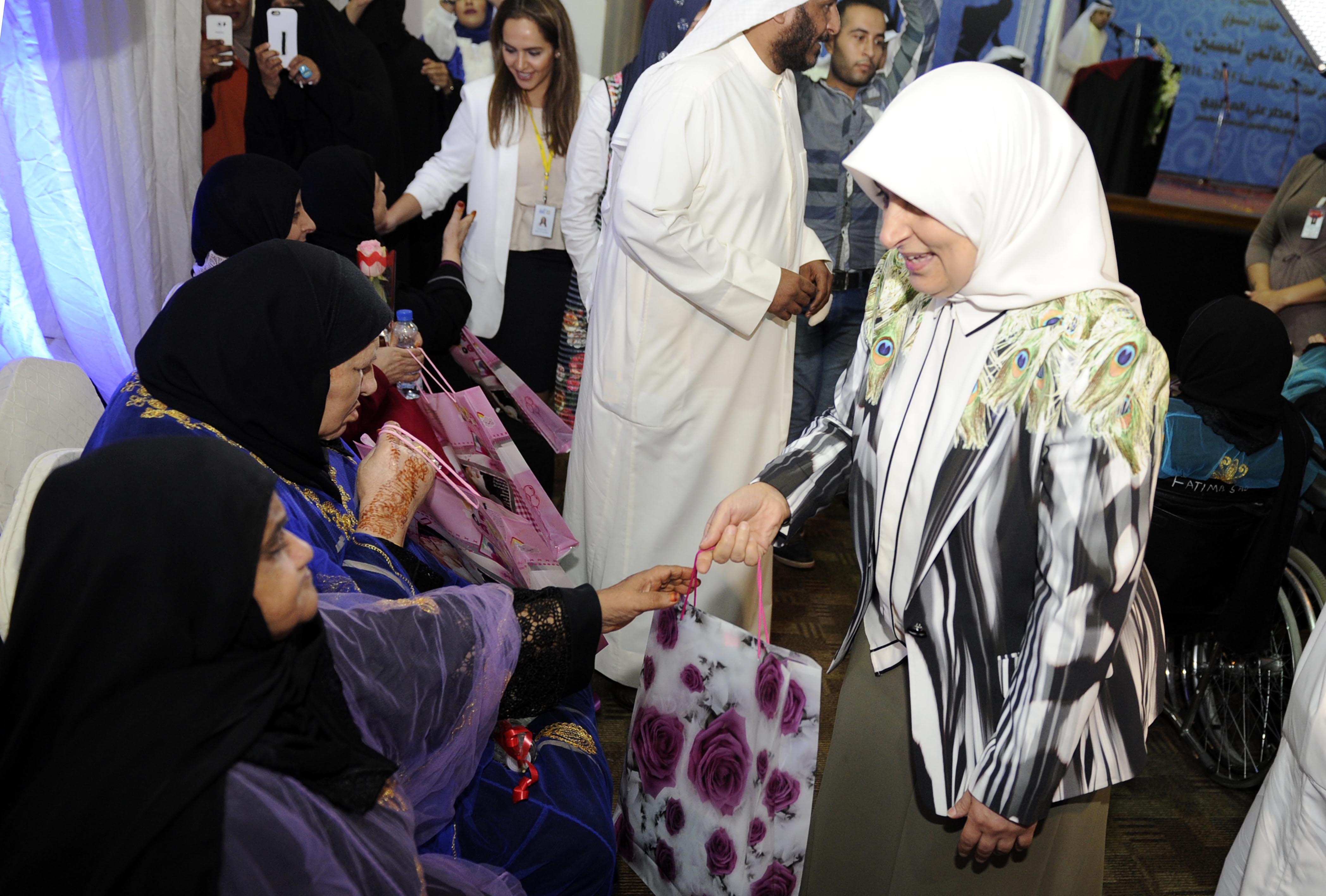 Minister of Social Affairs and Labor and State Minister for Planning and Development Hend Al-Sabeeh marking the International Day of Older Persons