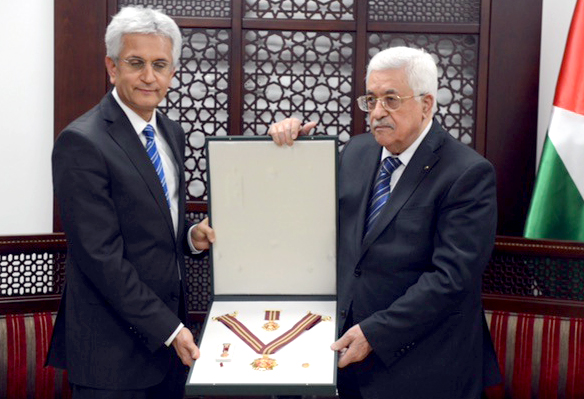 Palestinian President Mahmoud Abbas During honored the eminent Kuwaiti economist Dr. Mirza Hassan