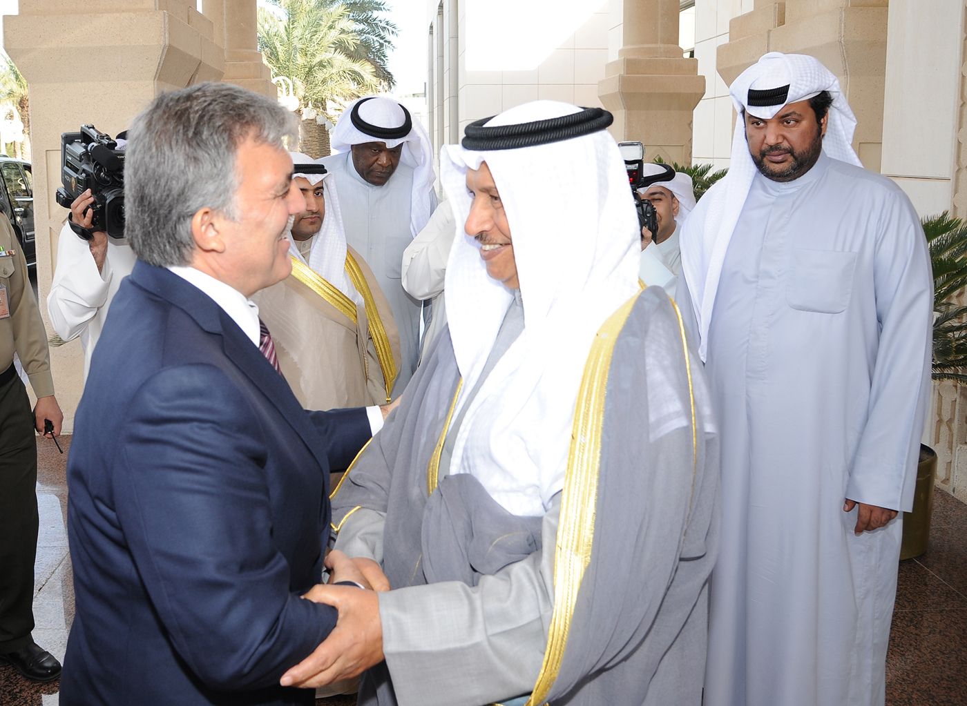 His Highness the Prime Minister Sheikh Jaber Al-Mubarak Al-Hamad Al-Sabah greets former Turkish President Abdullah Gul