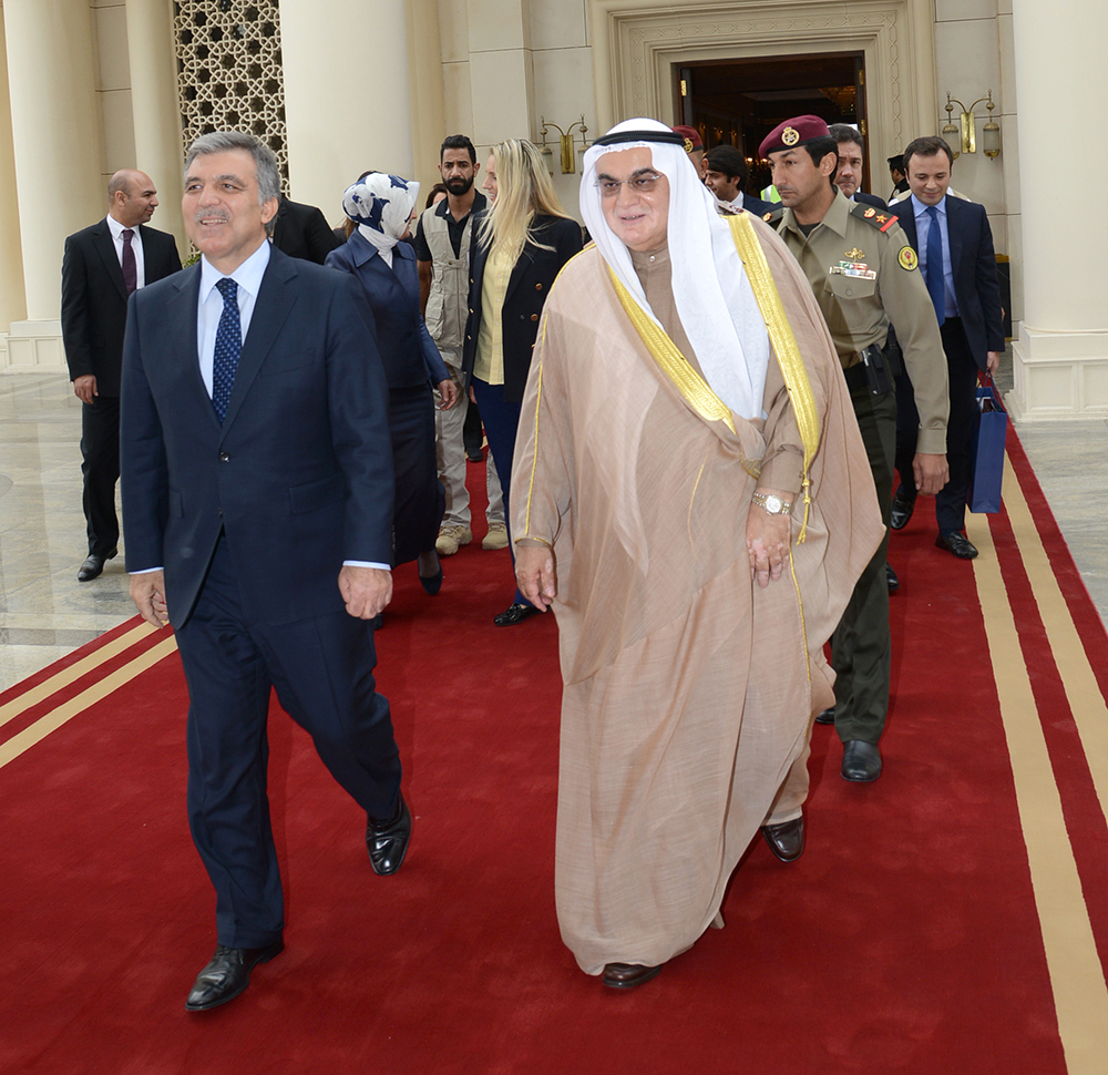 Former Turkish president Abdullah Gul leaves Kuwait seen off by the adviser at the Amiri Diwan Khaled Al-Fleij