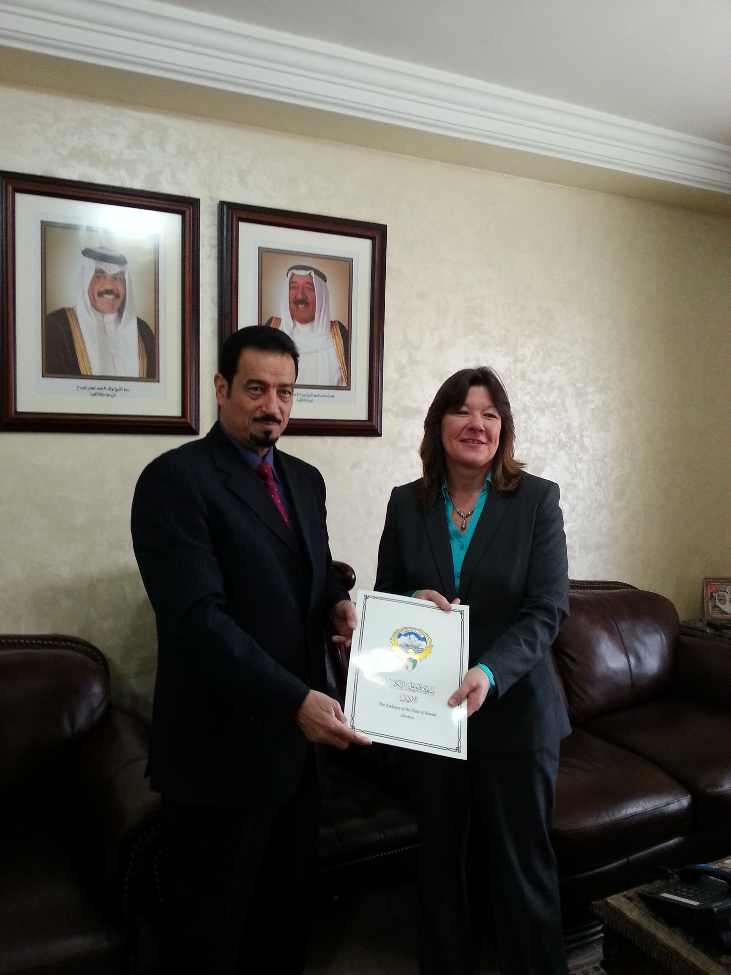Kuwait's Ambassador to Jordan Dr. Hamad Al-Duaij provides Deputy Commissioner-General of the (UNRWA), Sandra Mitchell Kuwaiti shareholding Relief and Works Agency for Palestine Refugees