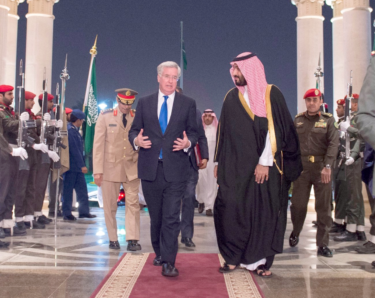 Minister of Defense, Chief of the Royal Court, and Special Adviser to the Saudi King Prince Mohammed bin Salman bin Abdulaziz Al-Saud with the British Secretary of State for Defense Michael Fallon
