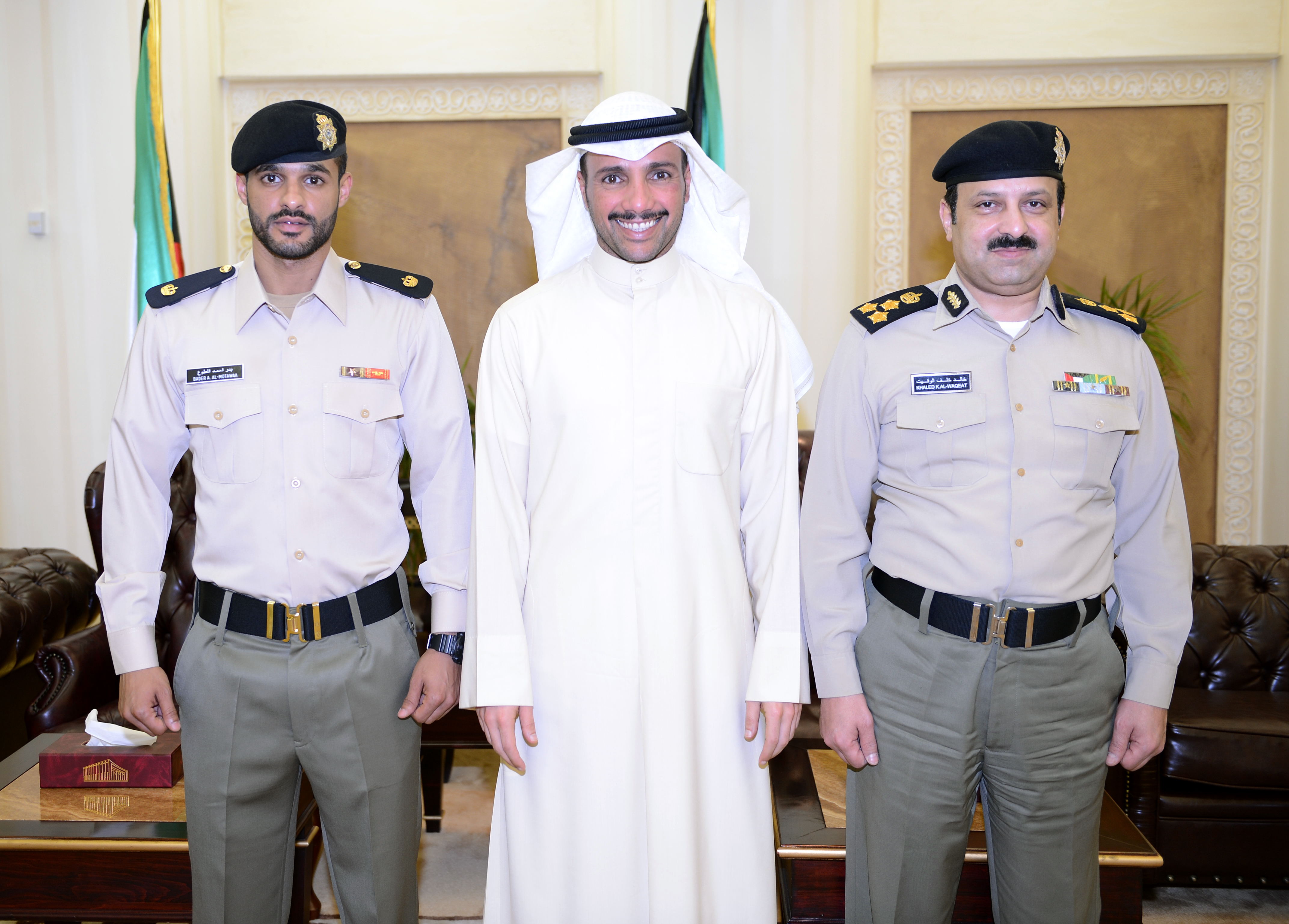 National Assembly Speaker Marzouq Al-Ghanim with National Assembly Security Chief Khalid Al-Waqeet and Officer Bader Al-Matawaa