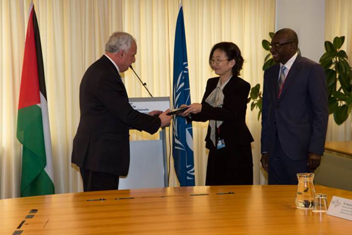 ICC Second Vice-President Judge Kuniko Ozaki in the  presence of the President of the Assembly of States Parties, Sidiki Kaba  presents Minister of Foreign Affairs of Palestine  Riad Al-Malki with a  special edition of the Rome Statute