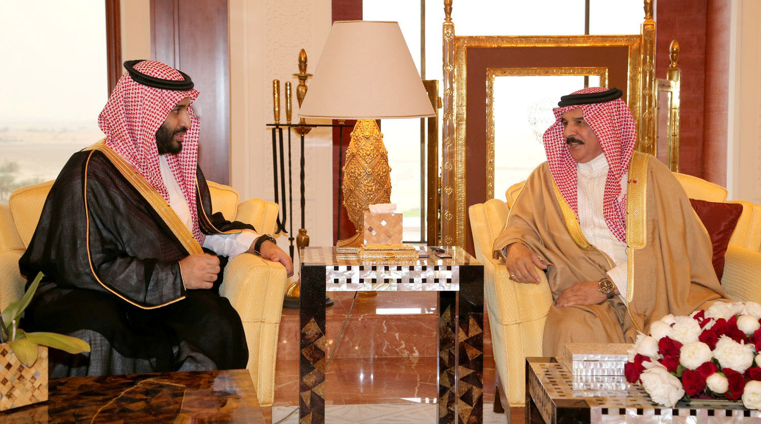 Bahraini King Hamad bin Isa Al-Khalifa with visiting Saudi Defense Minister Prince Mohammad bin Salman
