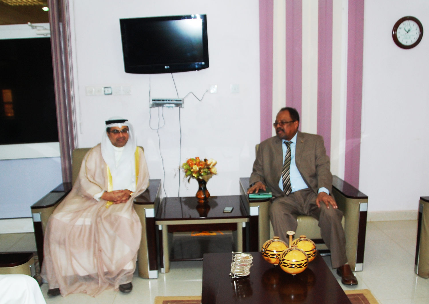 Ambassador to Sudan Talal Mansour Al-Hajri with the Minister of Environment and Forests and Urban Development Hassan Hilal