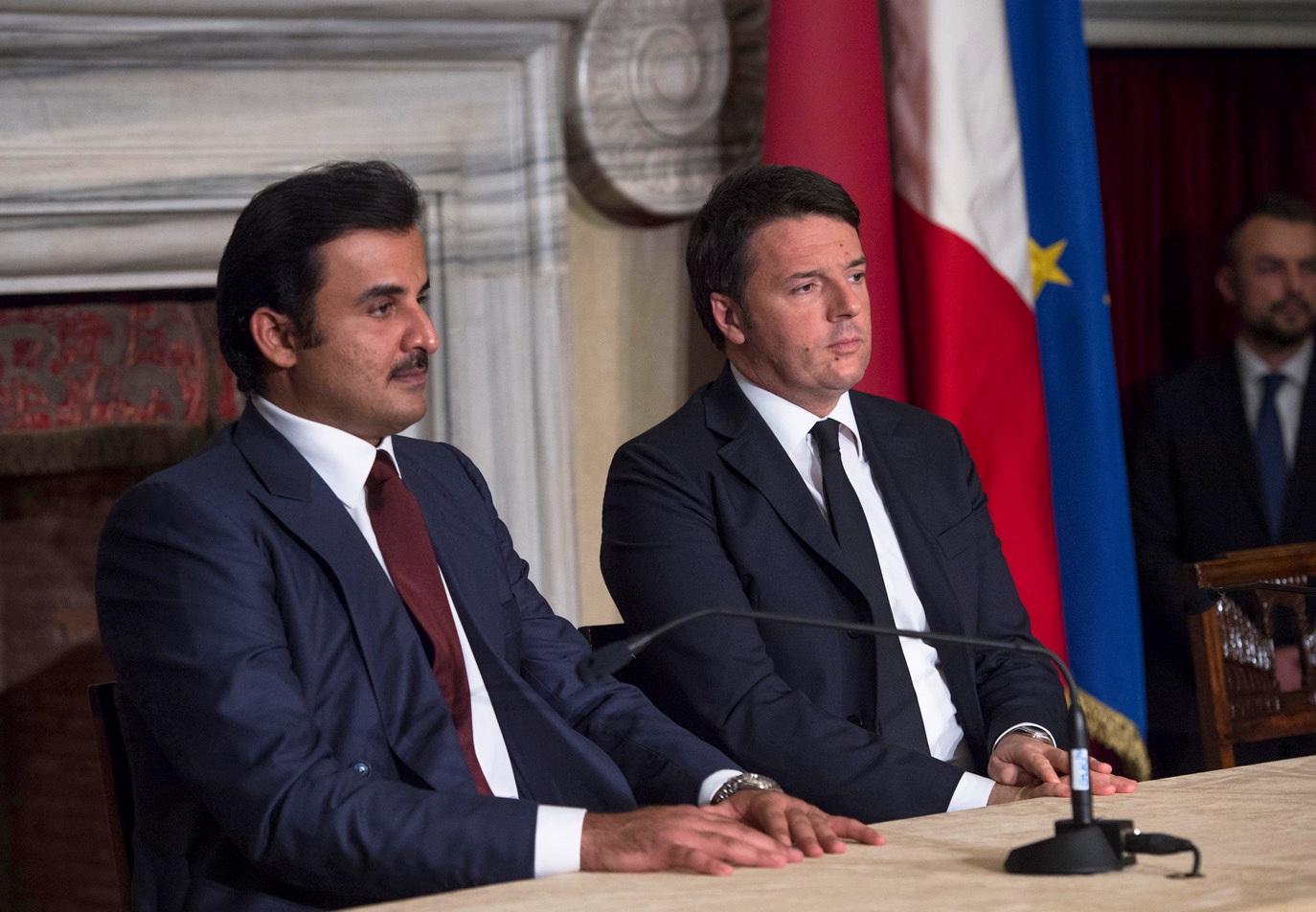 Qatar's Amir Sheikh Tamim bin Hamad Al-Thani and Italian Prime Minister Matteo Renzi