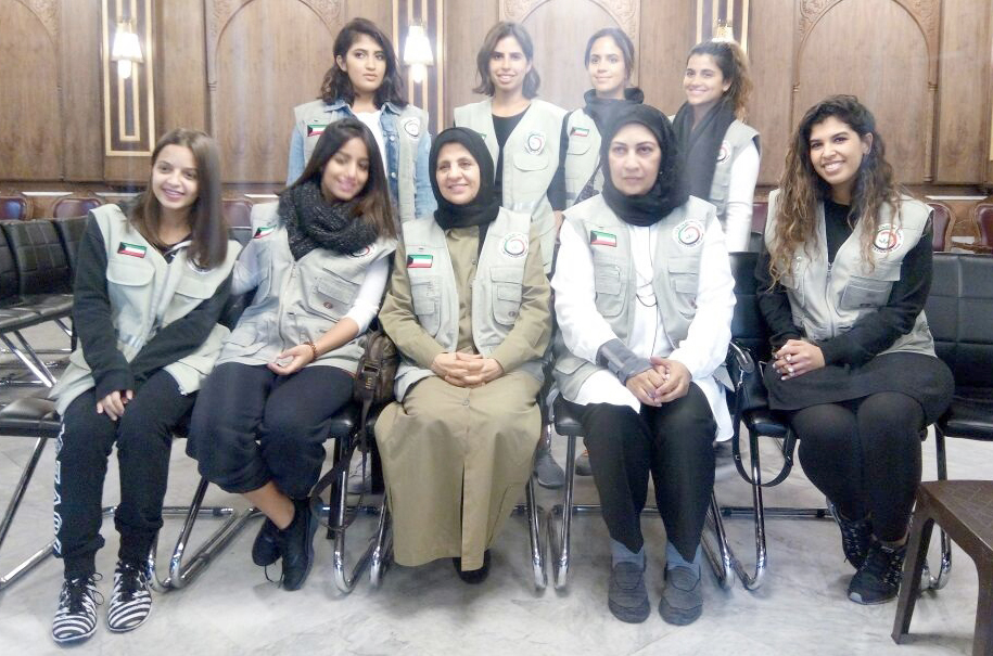 A voluntary team of Kuwaiti females from "Charity Group" during the distributing ceremony