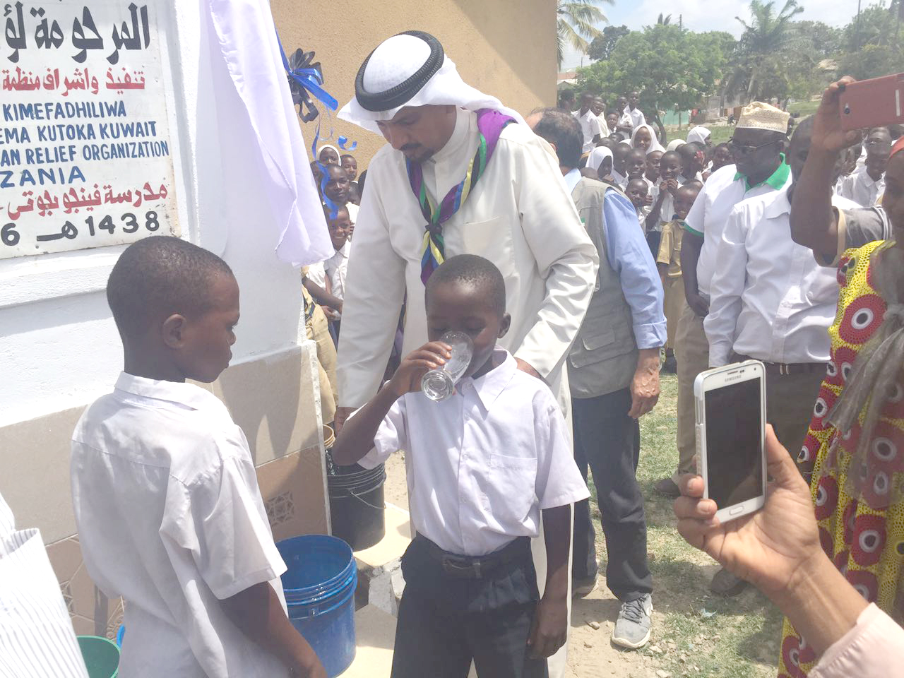 Ambassador of Kuwait to Tanzania Jassem Al-Najem inaugurates five water wells simultaneously at five schools in Dar es Salaam