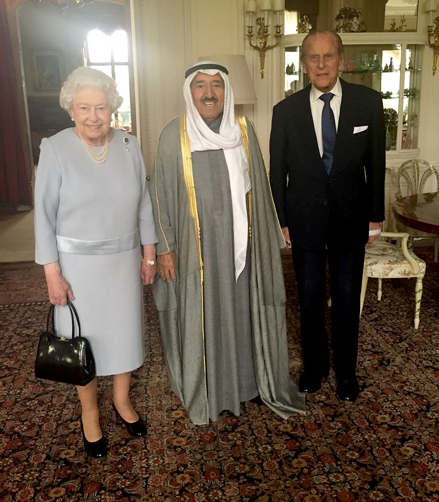 His Highness the Amir Sheikh Sabah Al-Ahmad Al-Jaber Al-Sabah visits Queen Elizabeth holding a meeting with her; attended by Prince Philip Duke of Edinburgh