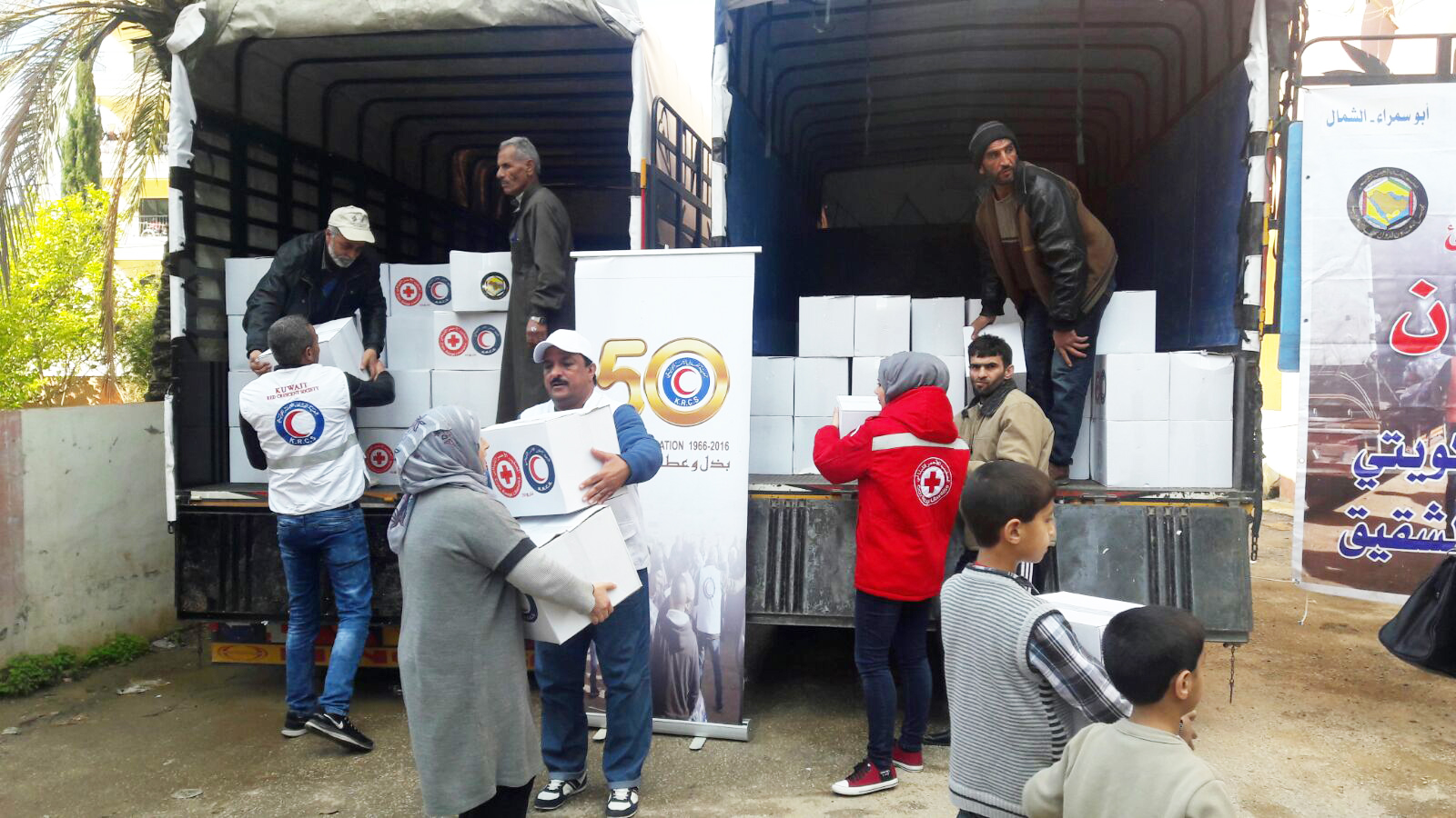 Kuwait Red Crescent Society (KRCS) delivering aid parcels to Syrian refugees in northern Lebanon
