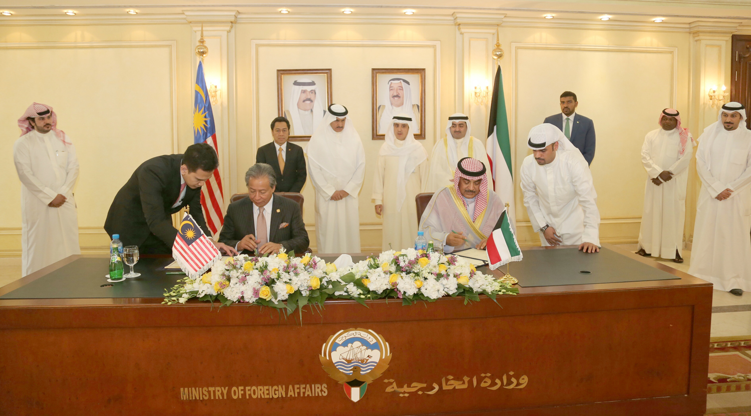 First Deputy Prime Minister and Foreign Minister Sheikh Sabah Al-Khaled Al-Hamad Al-Sabah and his Malaysian counterpart Dato Sri Anifah Haji Aman during the signing ceremony