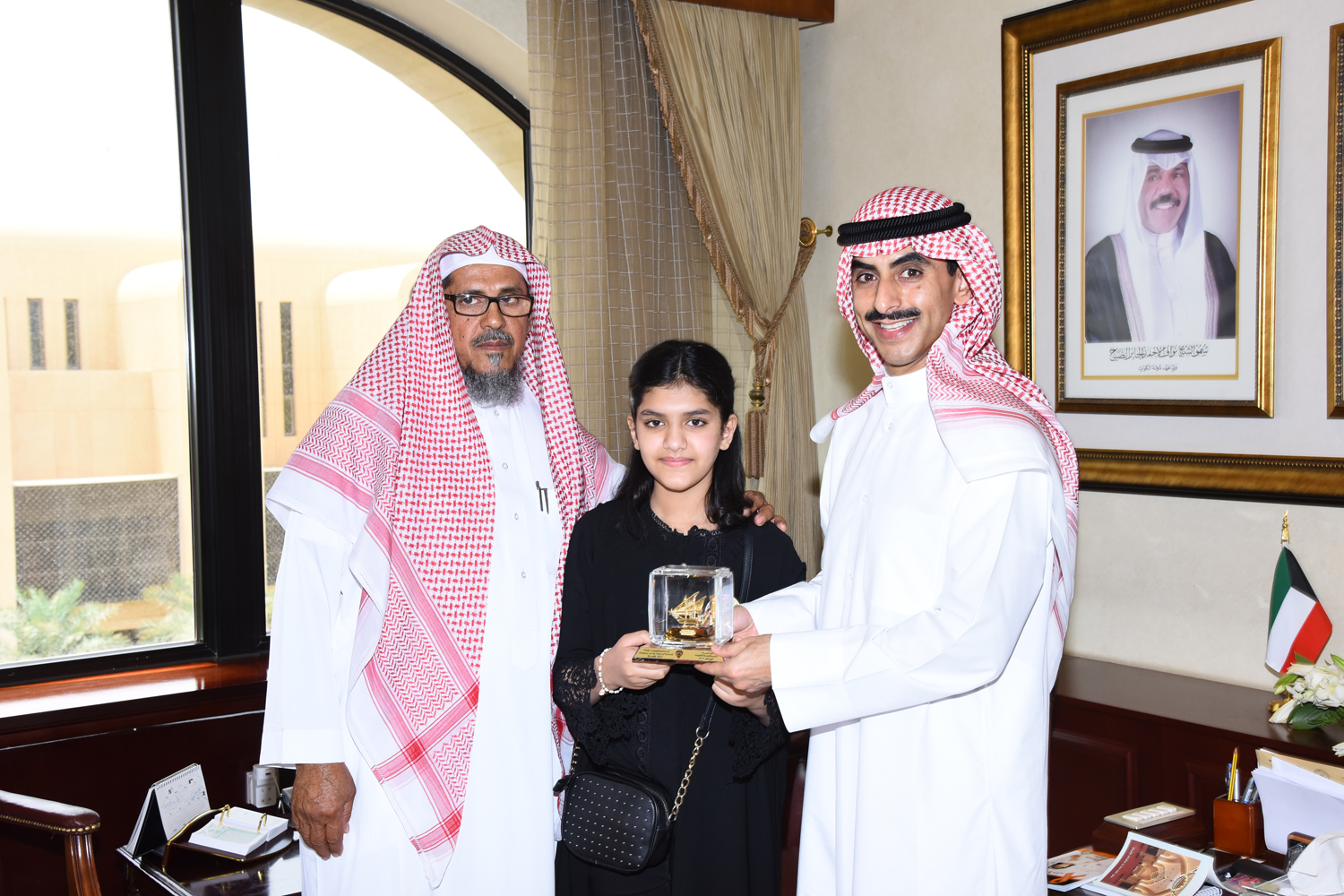 Kuwait's Ambassador to Saudi Arabia Sheikh Thamer Jaber Al-Ahmad Al-Sabah honors young girl Sharifa Mohammed Al-Hagbani