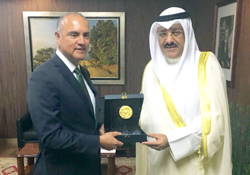 Kuwait's Ambassador to the United Mexican States Samih Johar Hayat with Minister of the Secretariat of Agriculture, Livestock, Rural Development, Fisheries and Food of Mexico (SAGARPA) Jose Edwardo exchanging