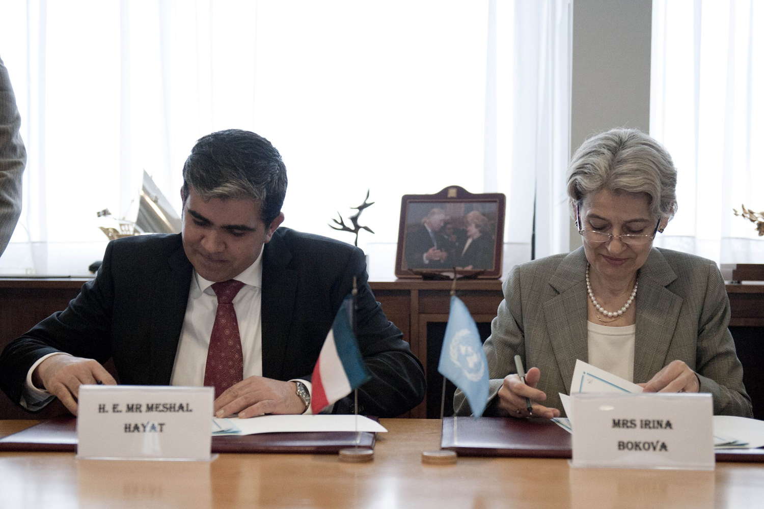 Kuwait's permanent representative to UNESCO Dr. Misha'al Hayat with Director-General of UNESCO Irina Bokova during the signature ceremony