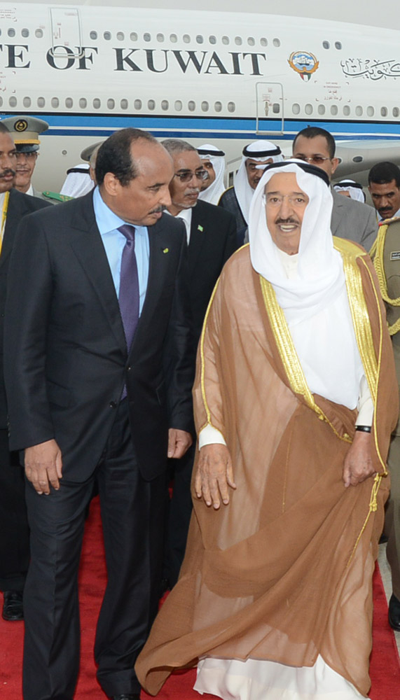 His Highness the Amir Sheikh Sabah Al-Ahmad Al-Jaber Al-Sabah arrives in Nouakshcott to chair Kuwait's delegation to the 27th Arab Summit and was received by Mauritanian President Mohammad Ould Abdulaziz