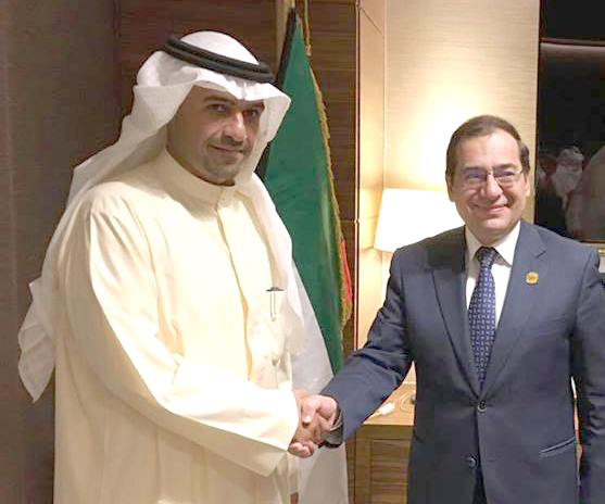 Deputy Prime Minister, Finance Minister and Acting Oil Minister Anas Al-Saleh with Egyptian Minister of Petroleum Tarek Al-Mullah