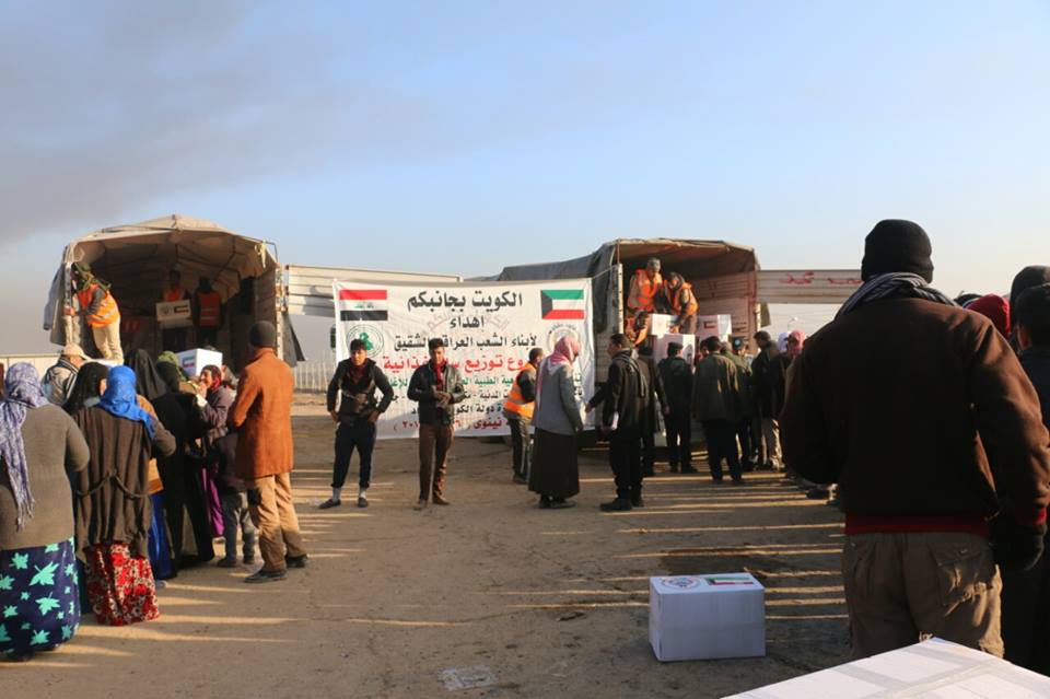 Families in Mosul delivered Kuwaits relief materials