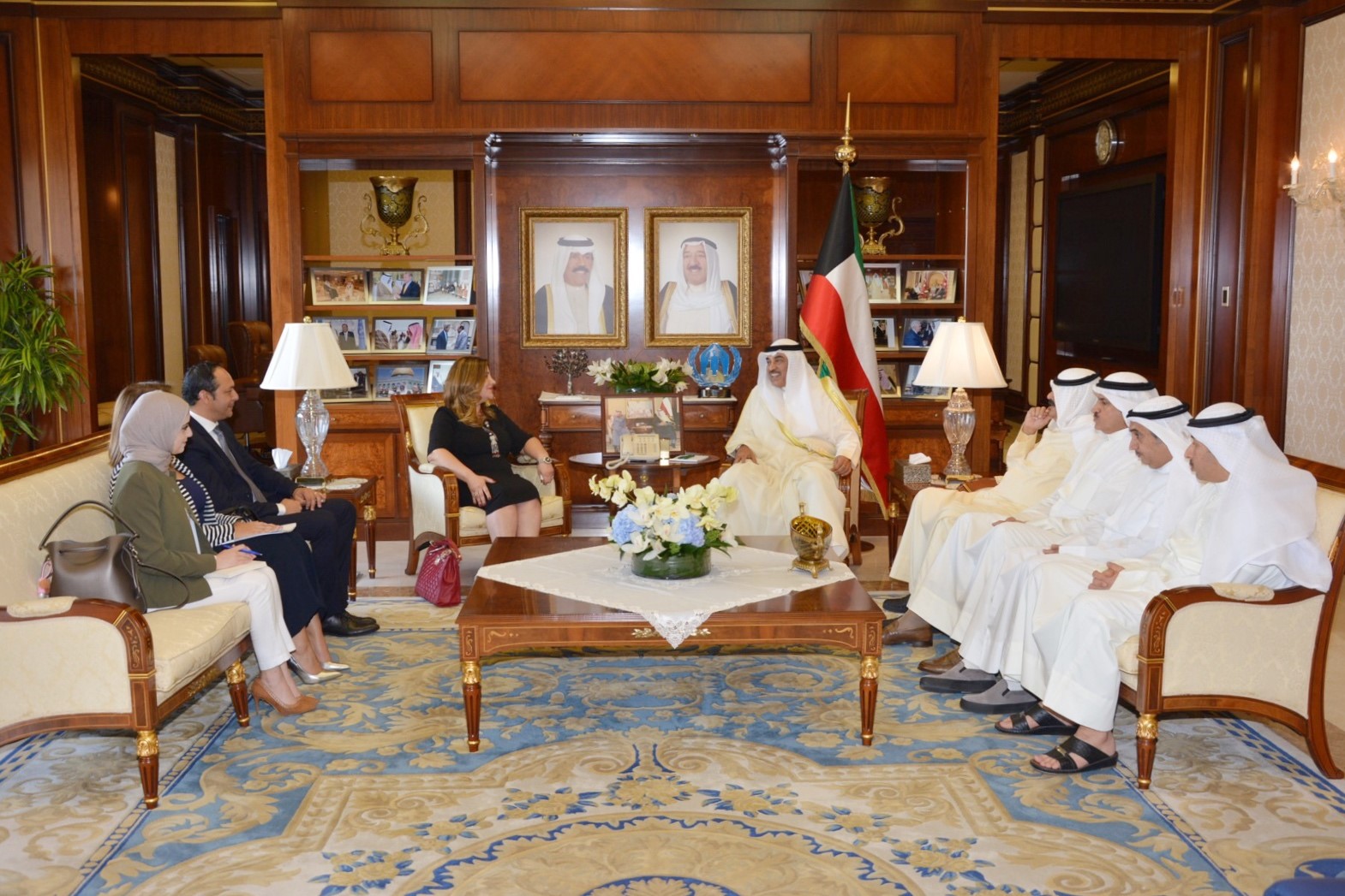 First Deputy Prime Minister and Foreign Minister Sheikh Sabah Al-Khaled Al-Hamad Al-Sabah with Dr. Hanan Hamdan, Head of the UN High Commissioner for Refugees (UNHCR) office in Kuwait