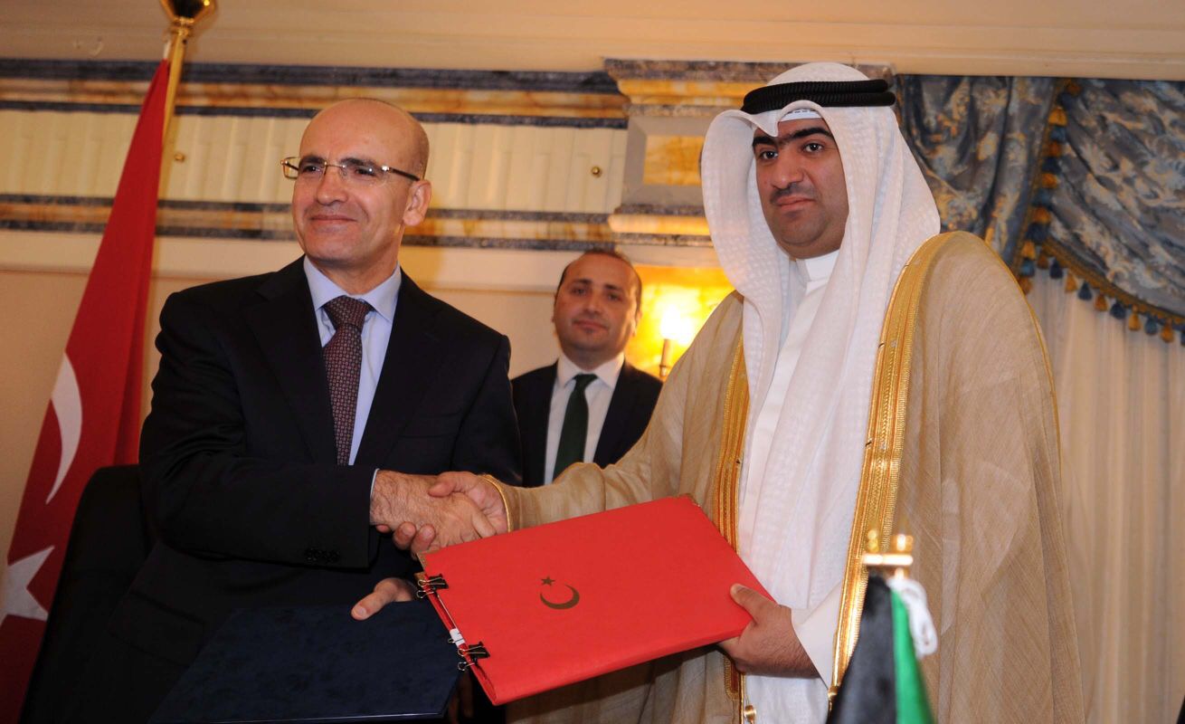 Minister of Commerce and Industry Khaled Al-Roudhan with Turkish deputy premier
