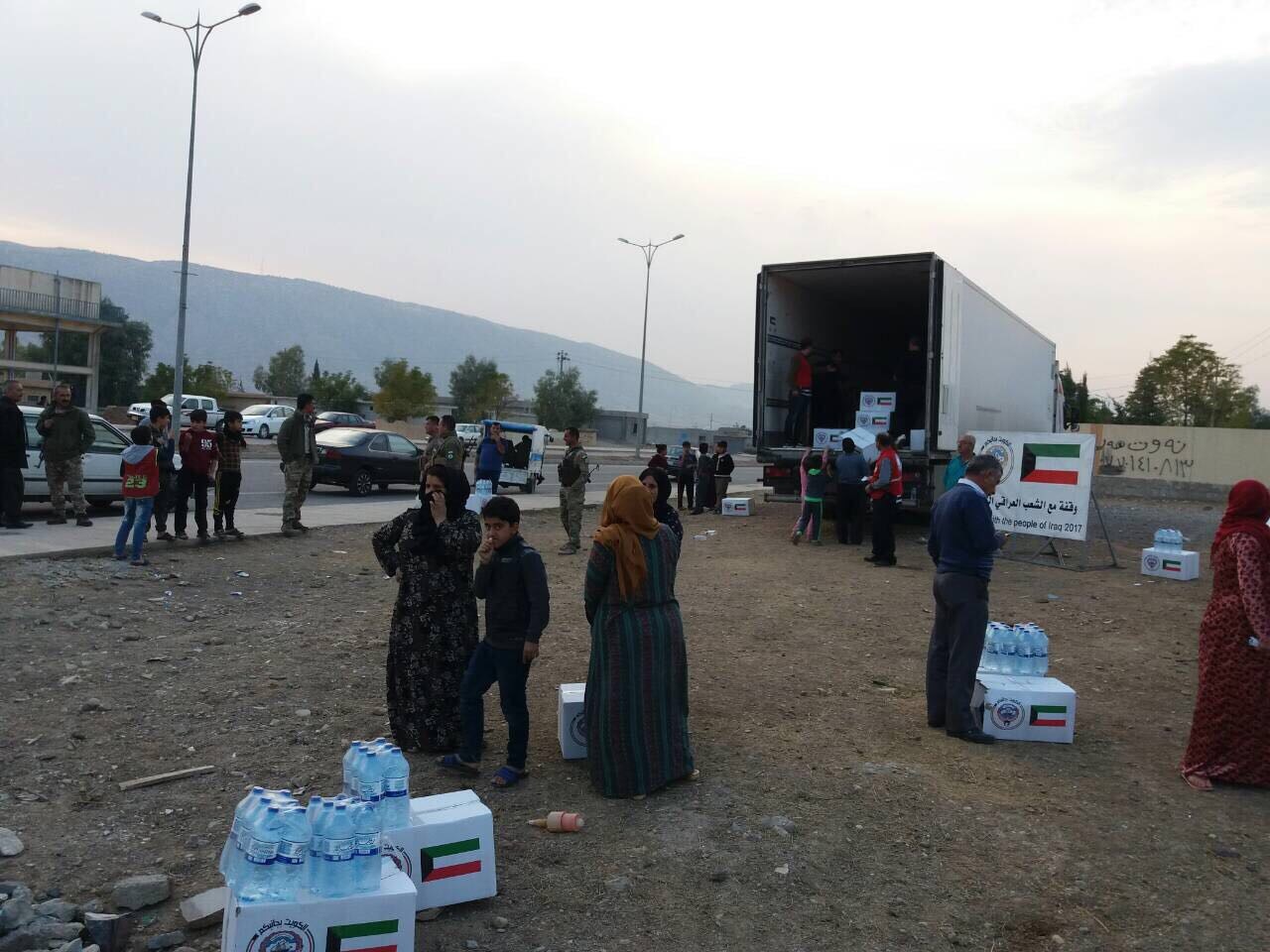 توزيع المساعدات على المتضررين من الزلزال في العراق