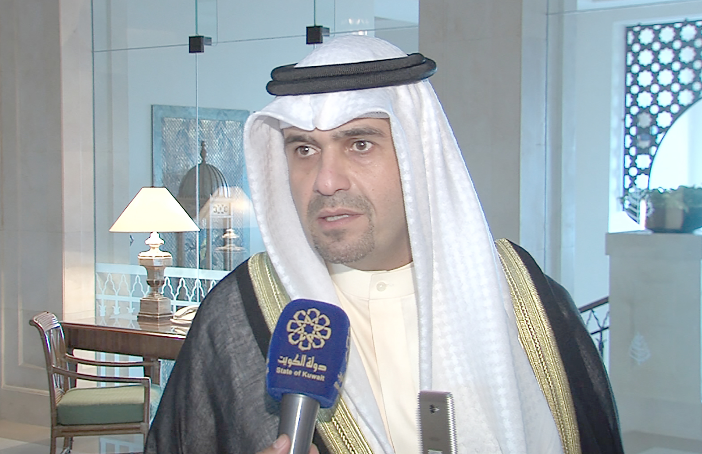 Representative of His Highness the Amir of Kuwait Sheikh Sabah Al-Ahmad Al-Jaber Al-Sabah, Deputy Premier and Finance Minister Anas Al-Saleh