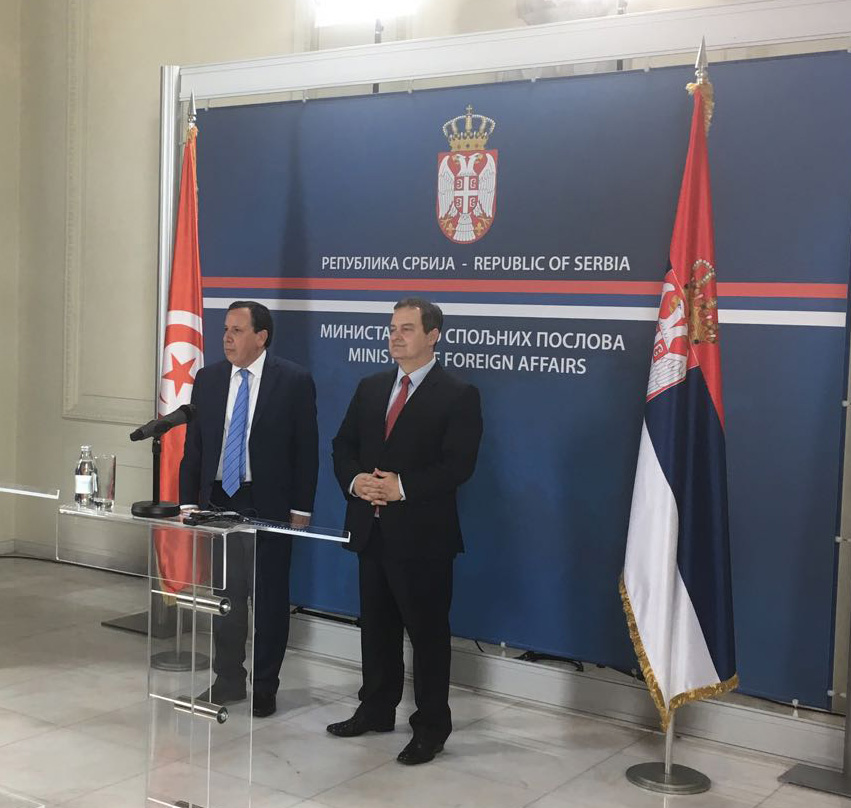 Tunisia's Foreign Minister Khemis Al-Jahnawi with Serbia's Foreign Minister Ivica Dacic