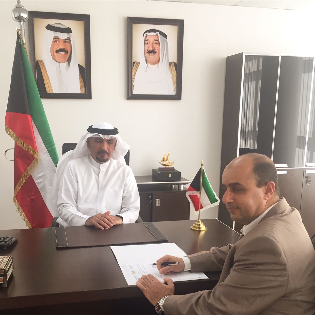 Director of the African Relief Organization, Sami Al-Azeb and Kuwaiti Ambassador to Tanzania Jassem Al-Najem during the signing ceremony