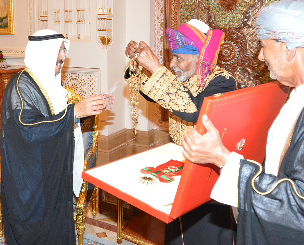 His Highness the Amir Sheikh Sabah Al-Ahmad Al-Jaber Al-Sabah and Sultan Qaboos bin Saeed of Oman exchange gifts