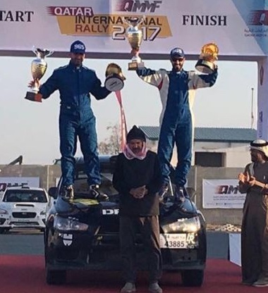 Kuwait's driver Mishari Al-Dhefeeri and Qatari 1st winner Rashed Al-Nuaimi during the inaguration ceremony