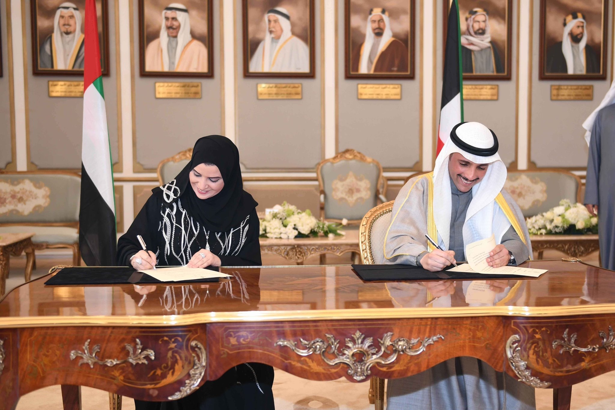 National Assembly Speaker Marzouq Al-Ghanim with Speaker of the UAE National Council Amal Abdullah Al-Qubaisi during the signature ceremony