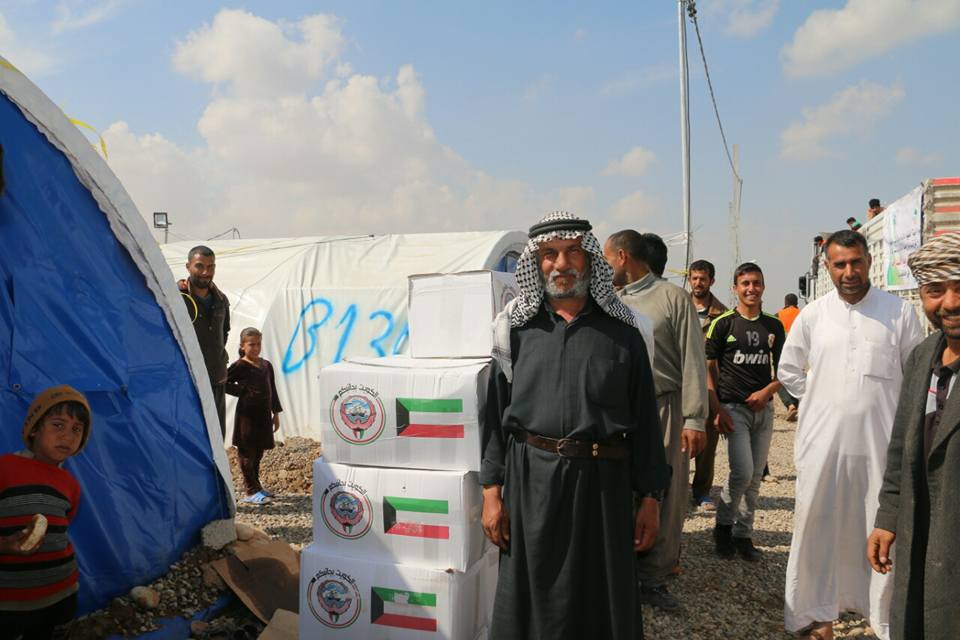 Kuwait Red Crescent Society distributes 3,000 food parcels on disputed Iraqis from Mosul and Hamam Al-Alil refugee camps in southern Mosul.