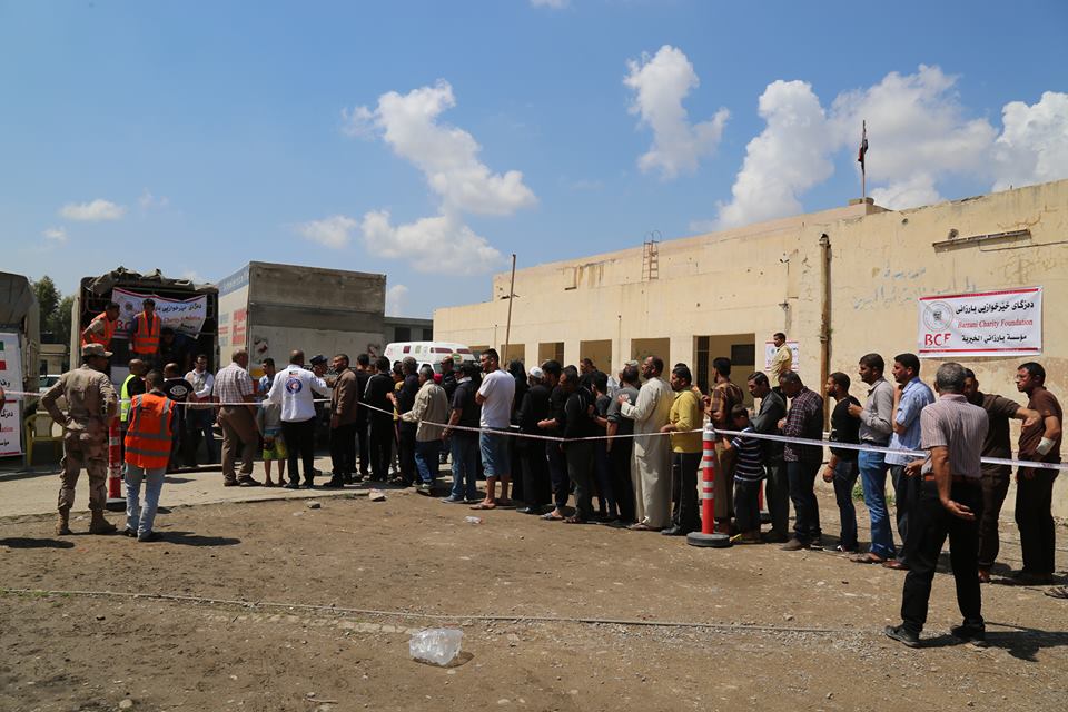 (KRCS) distributes 3,500 food parcels in several liberated parts of Iraq's Mosul