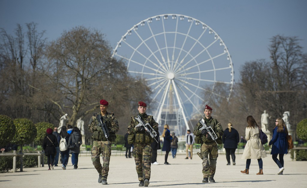 French military patrol in Tuileries gardens in central Paris
