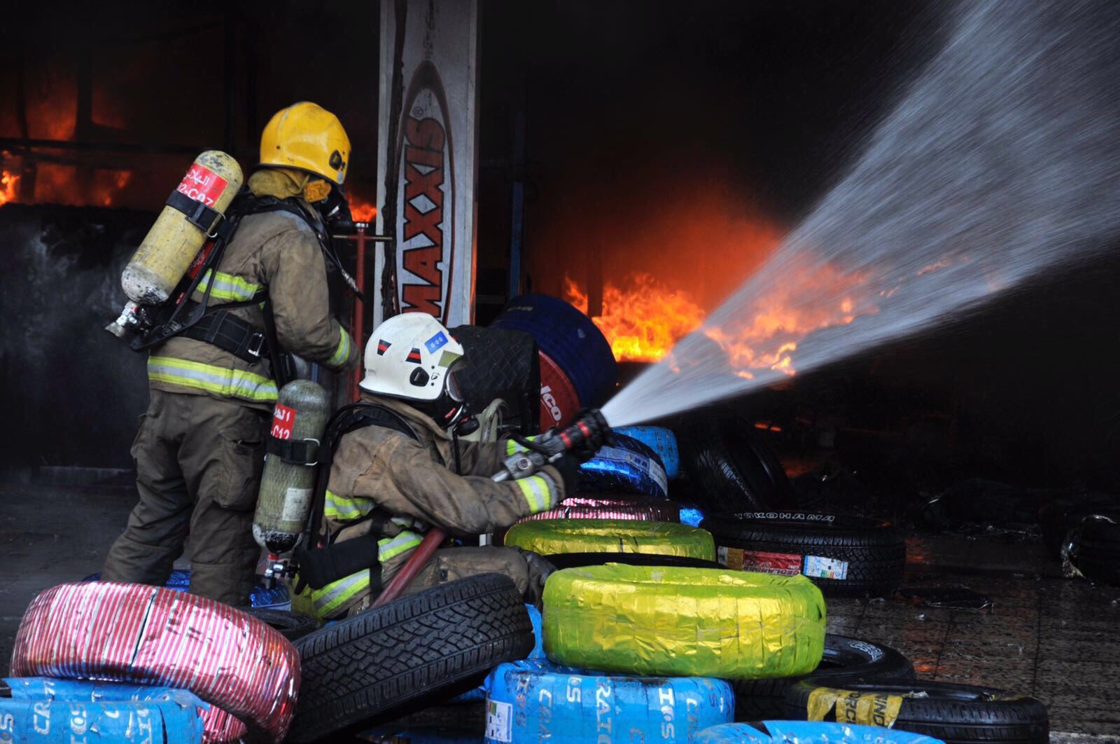 Fire fighters during the operations to  put out fires