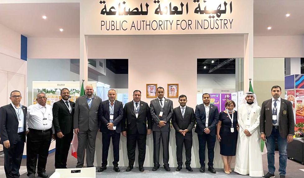 The Kuwaiti charge d'affaires in Malaysia.  the director of promotion at the Public Authority for Industry with visitors to the Kuwaiti pavilion