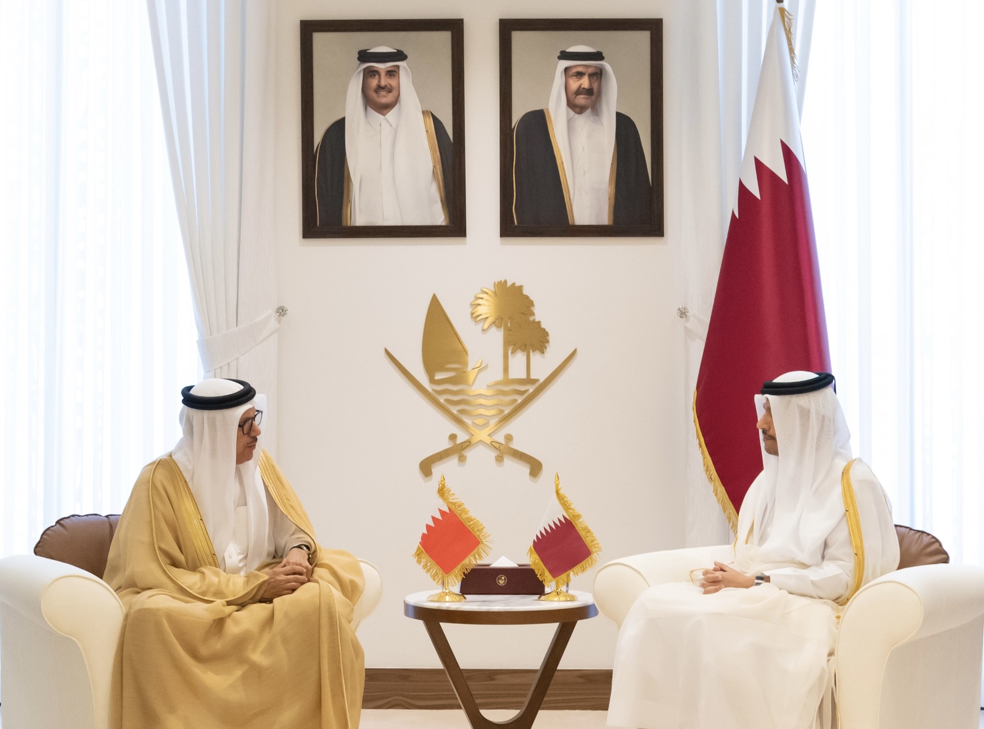 Qatari Prime Minister and Foreign Minister Sheikh Mohammad bin Abdulrahman with Bahraini Foreign Minister Dr. Abdullatif bin Rashid Al Zayani
