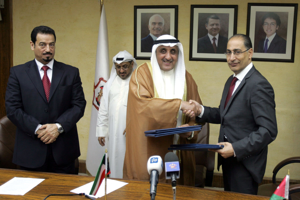 Director-General of Kuwait Fund for Arab Economic Development (KFAED) Mr. Abdulwahab Al-Bader and Jordan's Minister of Planning and International Cooperation Dr. Ibrahim Saif During signing two agreements