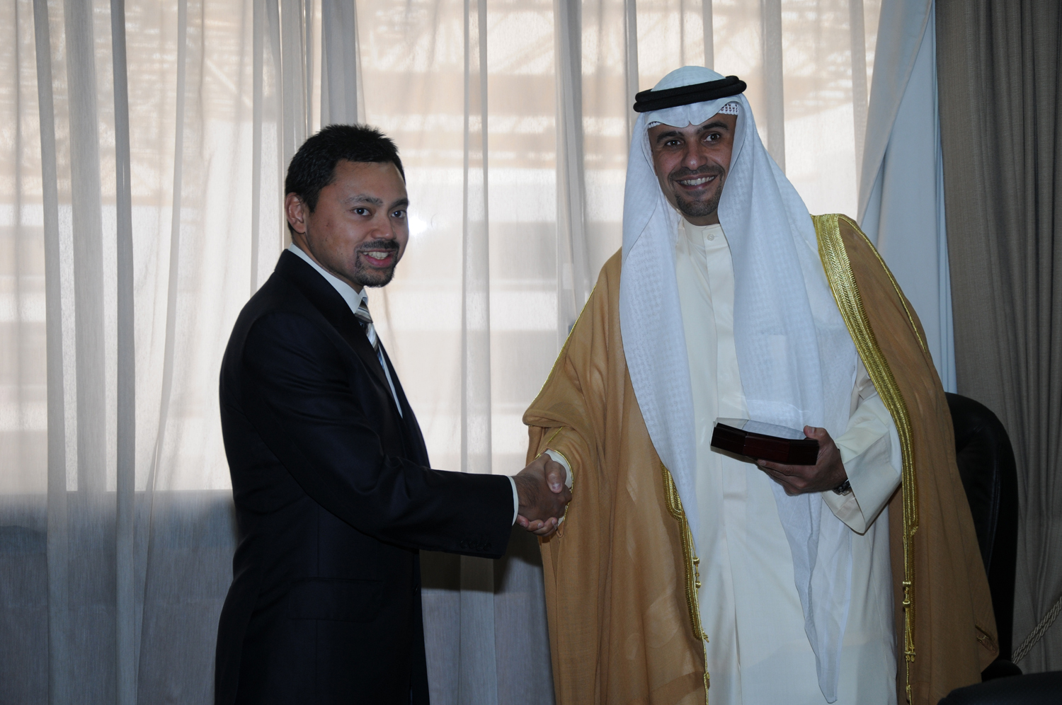 Crown Prince of Brunei Darussalam and Senior Minister in the Prime Minister's Office Al-Haji Al-Muhtadee Billah WITH Minister of Finance Anas Khaled Al-Saleh