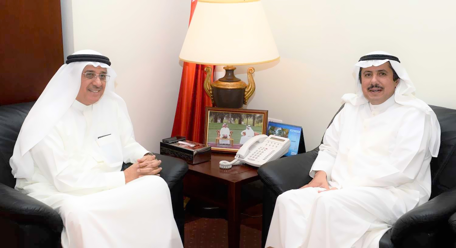 the King of Bahrain's Advisor for Media Affairs Nabil Al-Hamar with Kuwaiti Ambassador to Bahrain Sheikh Azzam Al-Sabah